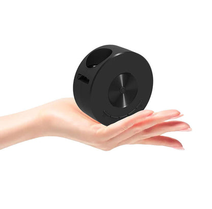 Smart Projector Wifi Portable Home Theater held in hand, showcasing its compact size and design for convenience.
